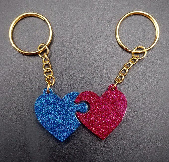 SAINT VALENTIN  - Double porte clef cœur rose et bleu à paillettes - A partager